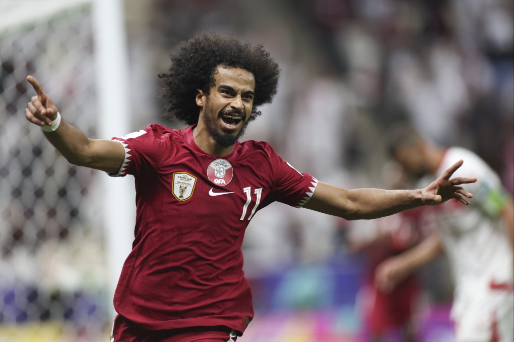 Akram Afif celebrates scoring during Qatar’s defeat of Lebanon in the AFC Asian Cup opener on Friday. Photo: Xinhua