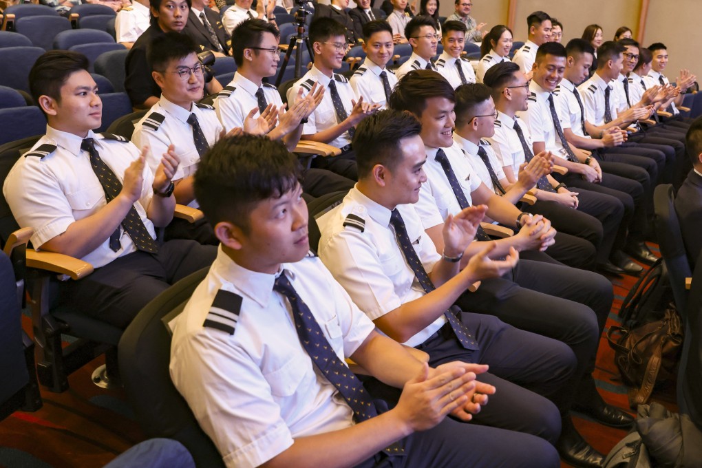 Cathay Pacific cadet pilots attend a graduation ceremony. The Hong Kong flag carrier has slashed flying hours required to train as captain by 25% amid a manpower crunch. Photo: Yik Yeung-man