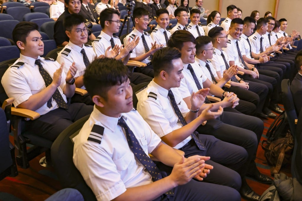 Cathay Pacific cadet pilots attend a graduation ceremony. The Hong Kong flag carrier has slashed flying hours required to train as captain by 25% amid a manpower crunch. Photo: Yik Yeung-man