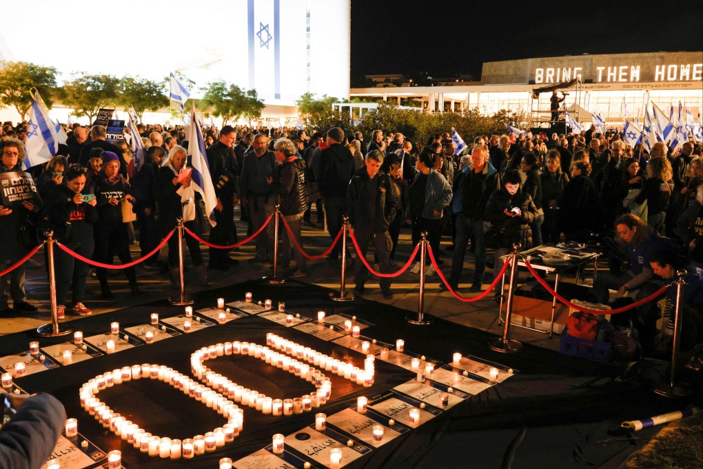 People gather in Habima Square in Tel Aviv to protest against the Israeli government on Saturday, as the war in Gaza nears 100 days. Photo: AFP