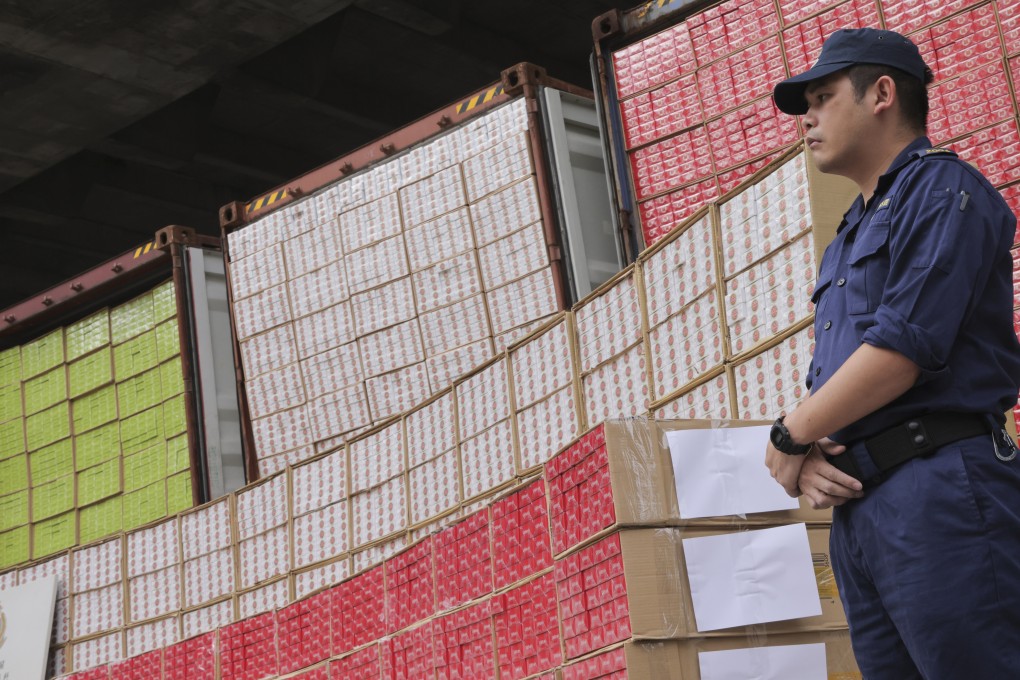Customs displays seized cigarettes during a press conference in November last year. Photo: Jelly Tse