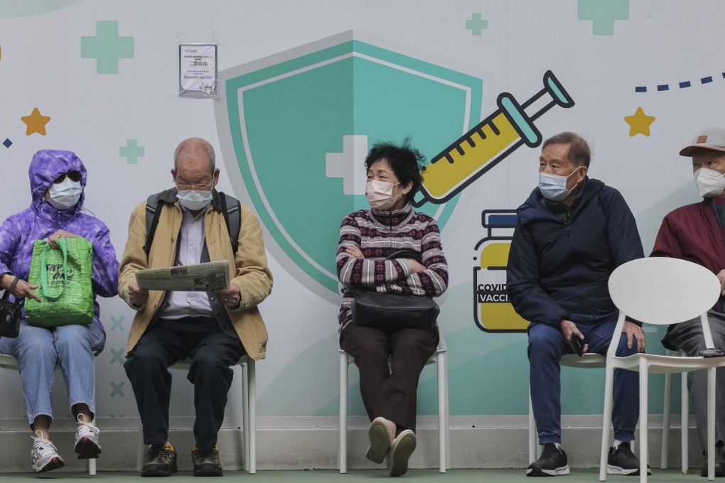 People wait to get a Covid-19 jab at the Java Road Playground Community Vaccination Station in Hong Kong on January 4 last year. Hongkongers are worried about a recent rise in both flu and Covid-19 cases. Photo: Jelly Tse