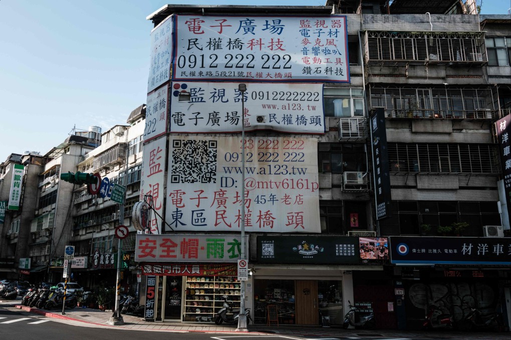 Empty billboards in Taipei following the removal of posters of presidential and legislative candidates a day after the election. Photo: AFP