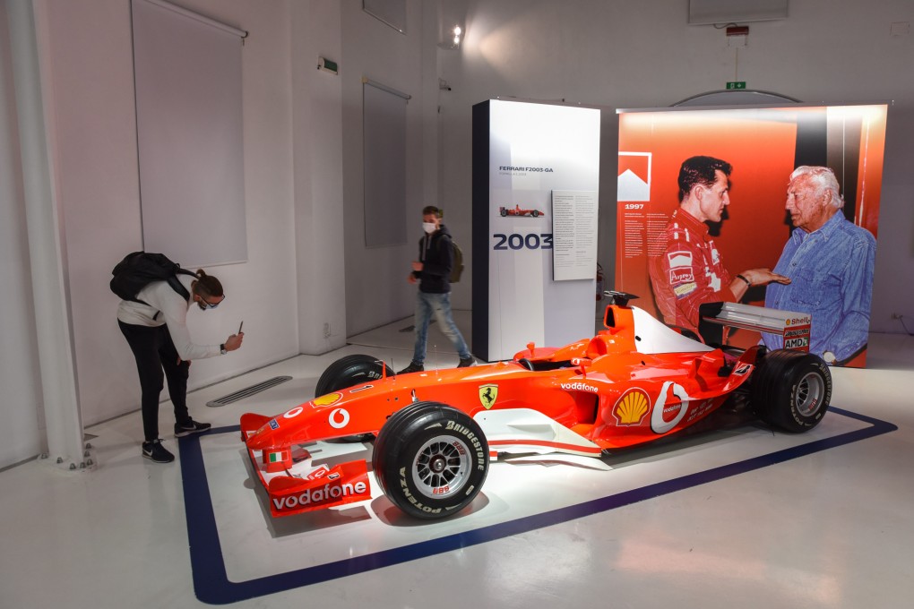 Visitors to Modena’s Enzo Ferrari Museum view a Ferrari F2003-GA racing car. The museum is one of two in the carmaker’s Italian home city that celebrate the marque’s history and that of its founder, Enzo Ferrari. Photo: Ronan O’Connell