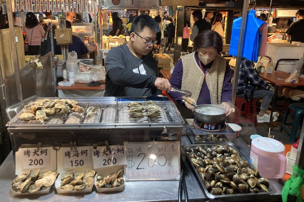 A grilled oyster stall at Tainan’s Flower Night Market. The night markets of Taiwan’s oldest city offer the largest selections of food, while other local delicacies can be found at places like hotpot restaurants. Photo: Cameron Dueck