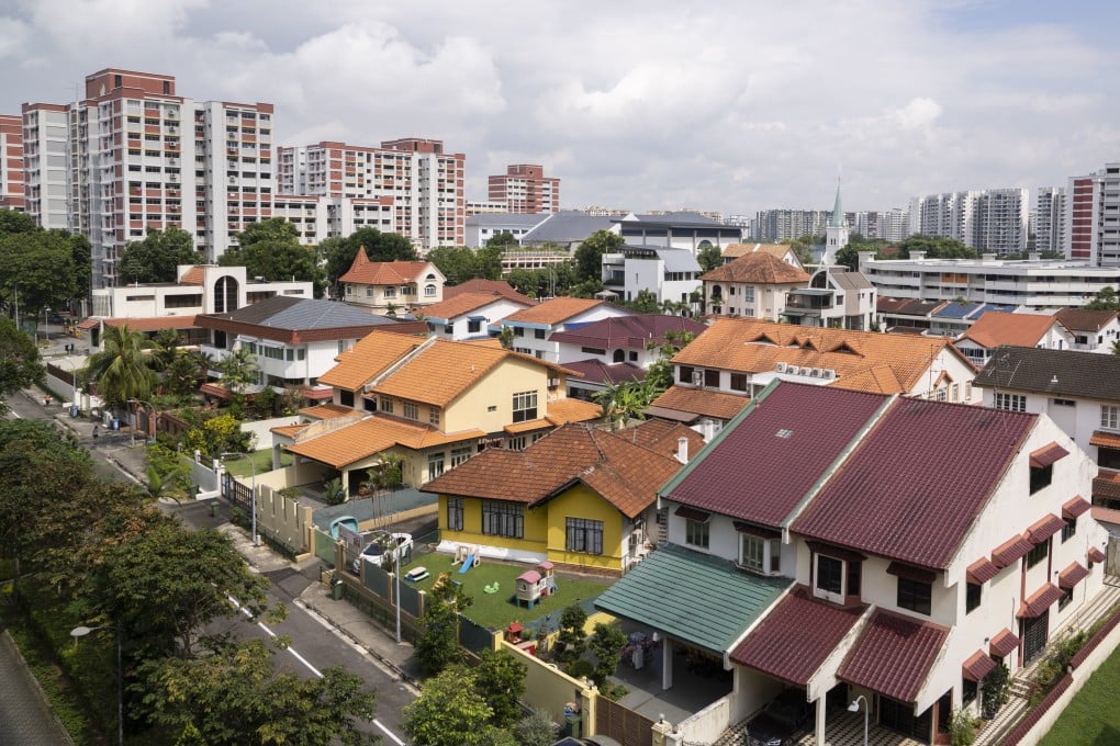 Singapore new private home sales fell to the lowest in 15 years, as housing curbs and weakening economic conditions began to weigh on the market. Photo: Bloomberg