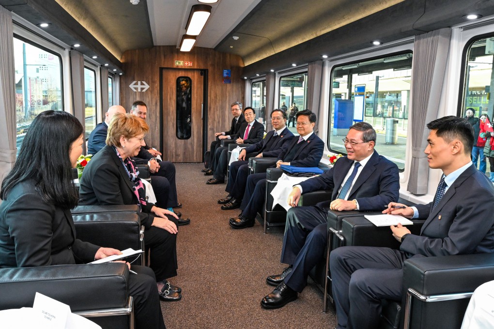 Chinese Premier Li Qiang travels with Swiss President Viola Amherd on a special train from Zurich to Bern on Sunday. Photo: Xinhua