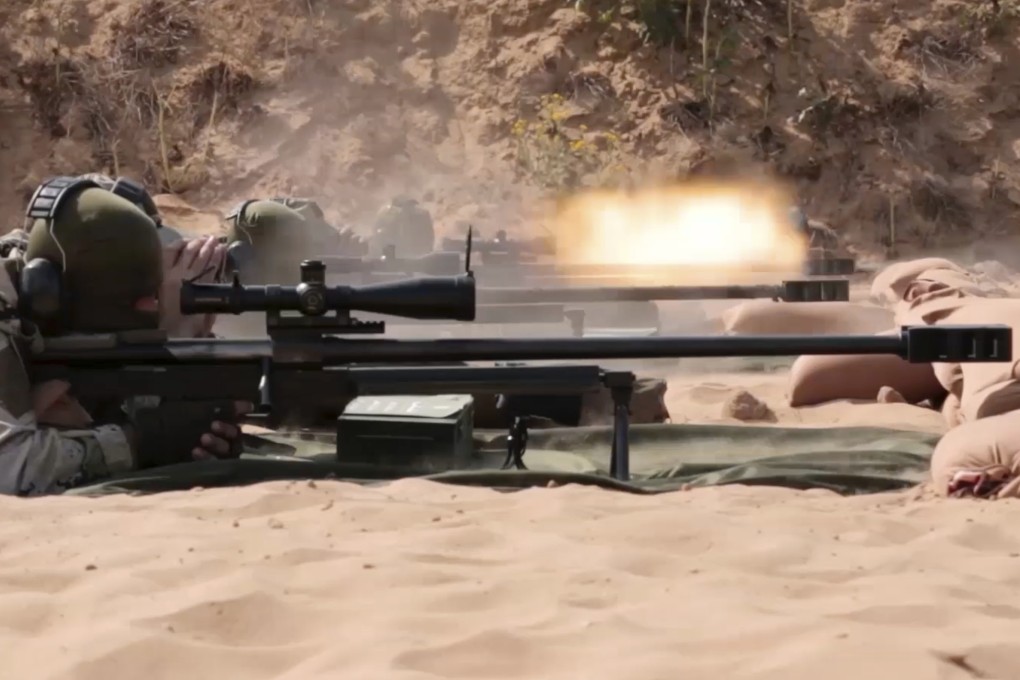 Hamas militants using domestic copies of the AM-50 Sayyad, an Iranian-made a sniper rifle. Photo: Hamas via AP