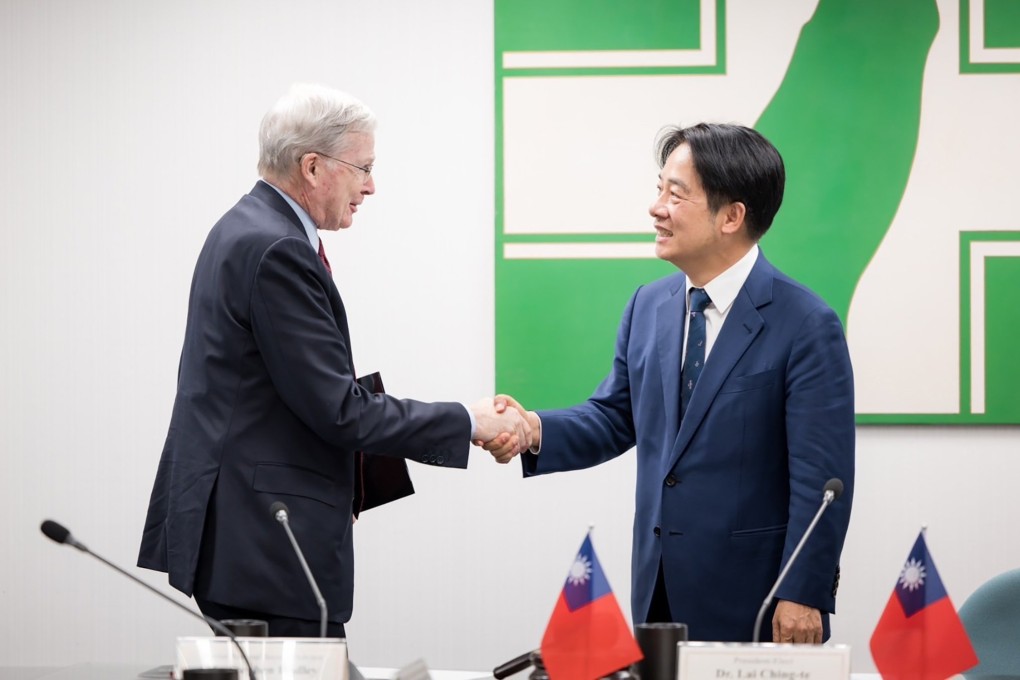 Taiwan President-elect William Lai shakes hands with former US National Security Advisor Stephen J. Hadley during a meeting inside the DPP headquarters in Taipei, Taiwan, on Monday. Photo: EPA-EFE/Democratic Progressive Party