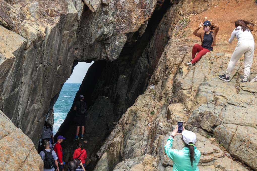 Hiking experts warn that switching your focus to your camera on rough terrain leaves you a single step from a fall. Photo: Jelly Tse