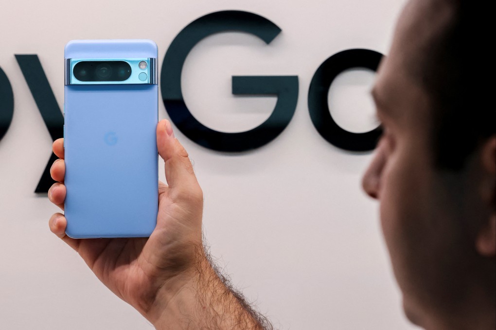 A person holds up Google’s Pixel 8 Pro smartphone in New York City on October 4, 2023. Photo: Reuters