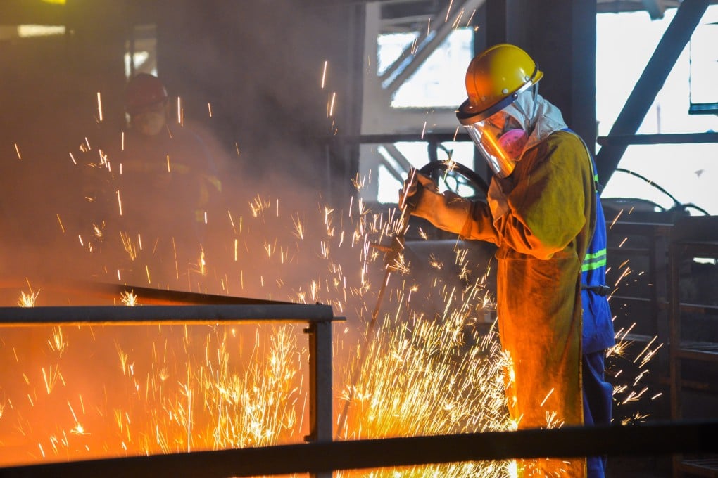 A worker works on a ferronickel production line in Weda Bay Industrial Park, North Maluku, Indonesia. Photo: Xinhua