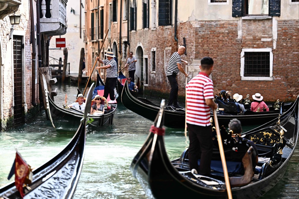 Venice has started issuing day tickets for tourists to reduce overtourism. The US$5.50 tickets are available online, and visitors caught without a permit could face a fine of €50 to €300. Photo: AFP