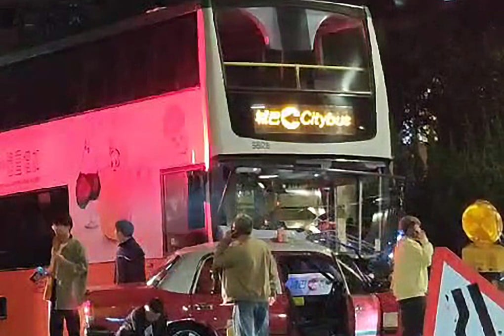 A taxi-bus crash has killed two people. Photo: Handout