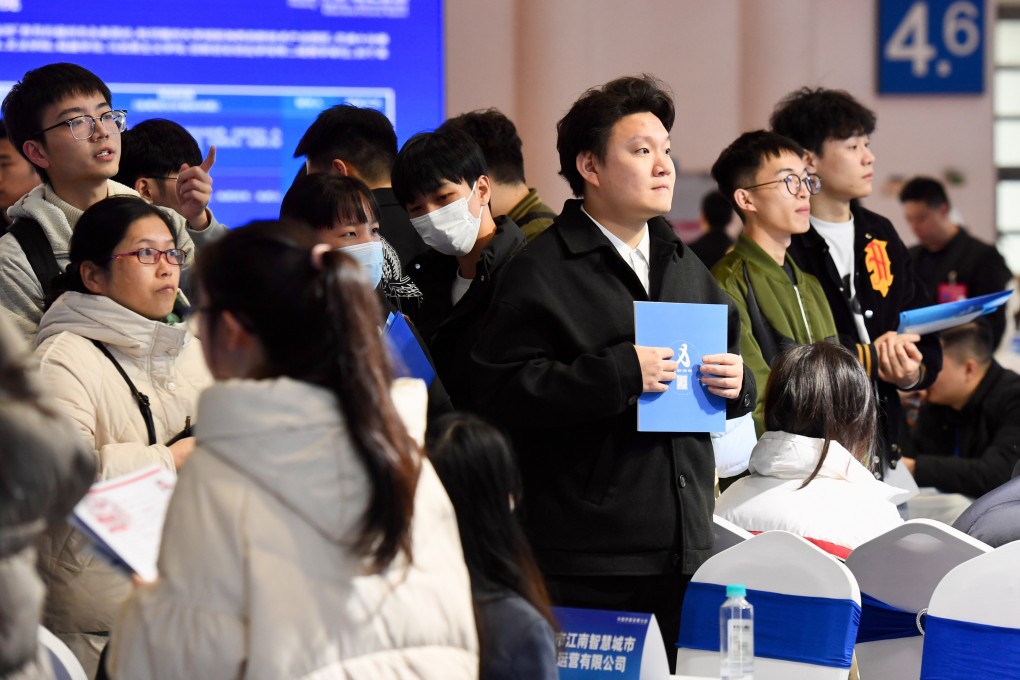 Jobseekers weigh their options at a recent career fair in China’s Fujian province, with more than 20,000 job vacancies looking to be filled. Photo: Xinhua