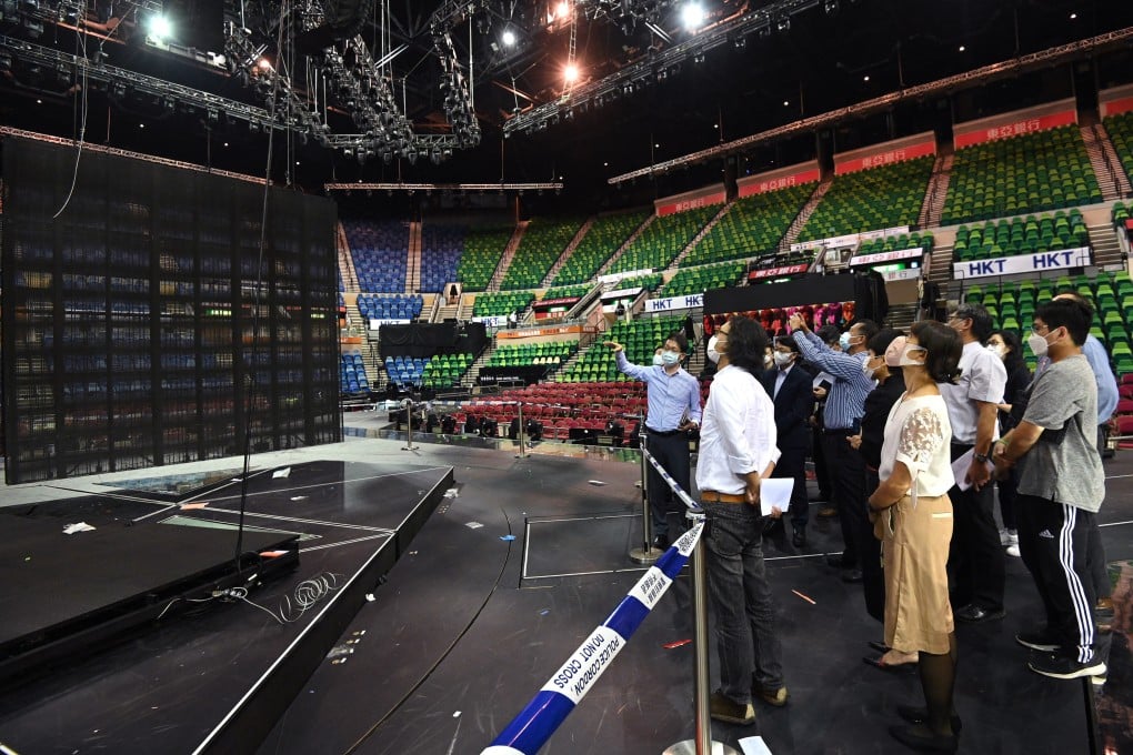 A task force led by the government examines the stage at the Hong Kong Coliseum in August 2022. Photo: Handout