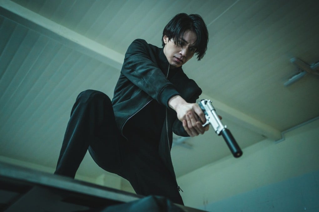 Lee Dong-wook as hitman Jeong Jinman in a still from “A Shop for Killers”, a stylish action-mystery series on Disney+ that co-stars Kim Hye-jun. Photo: Disney+
