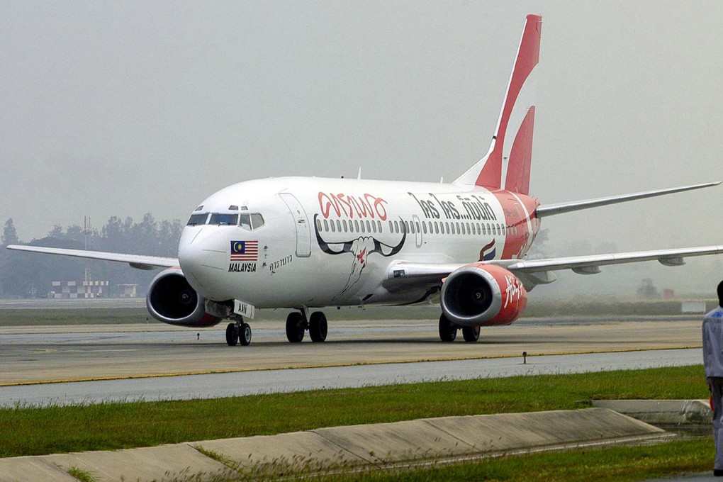 A Thai AirAsia plane lands at Bangkok airport. File photo: Reuters