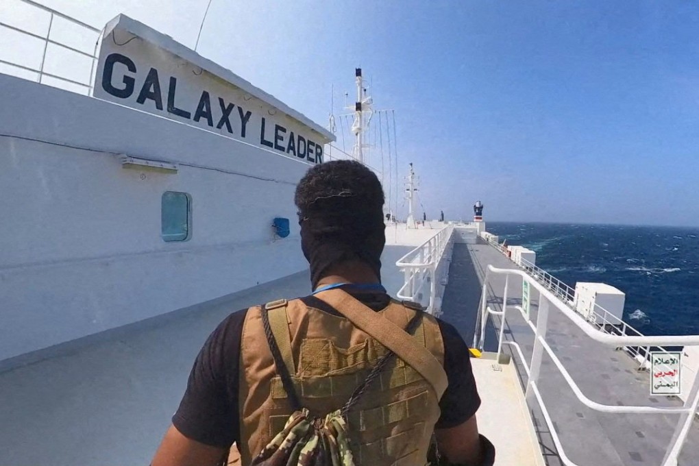 A Houthi fighter stands on the Galaxy Leader cargo ship in the Red Sea in a photo released in November. Photo: Houthi Military Media via Reuters