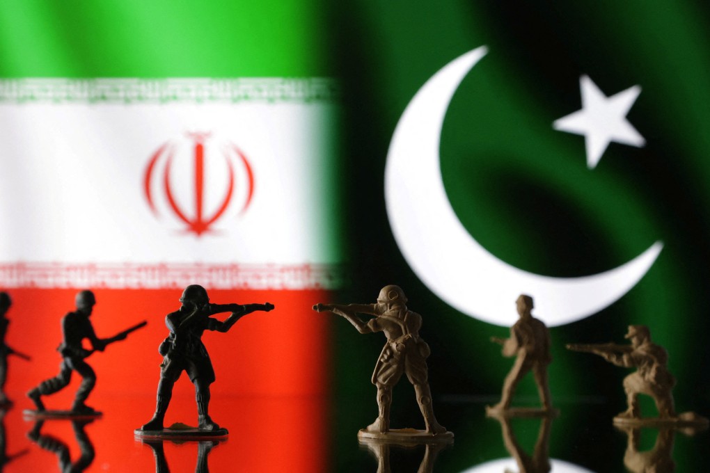 Miniature soldiers in front of Iranian and Pakistani flags. Photo: Reuters
