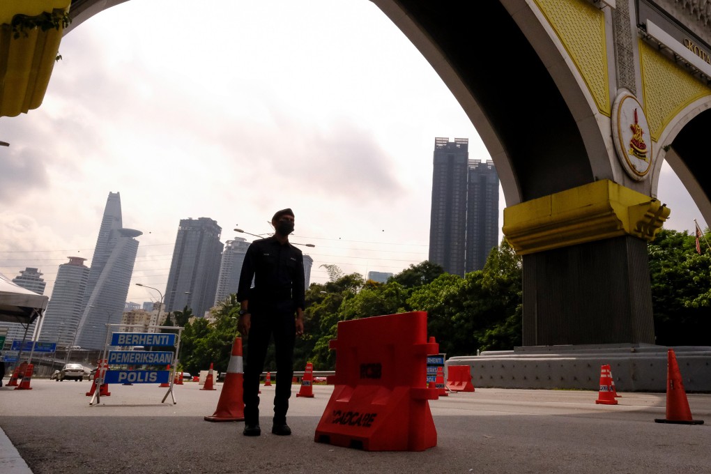 Malaysian police have arrested a man for producing his own pornographic videos and selling them on social media. Photo: Bloomberg