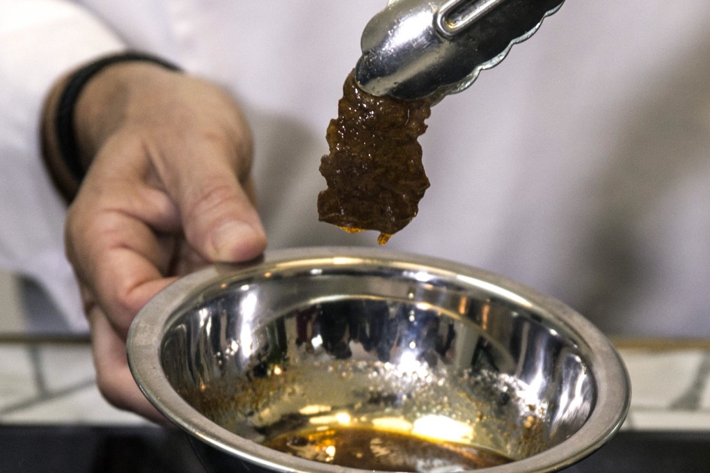 A chef prepares a lab-grown steak during a presentation by Aleph Farms, in Jaffa, Israel. File photo: AP
