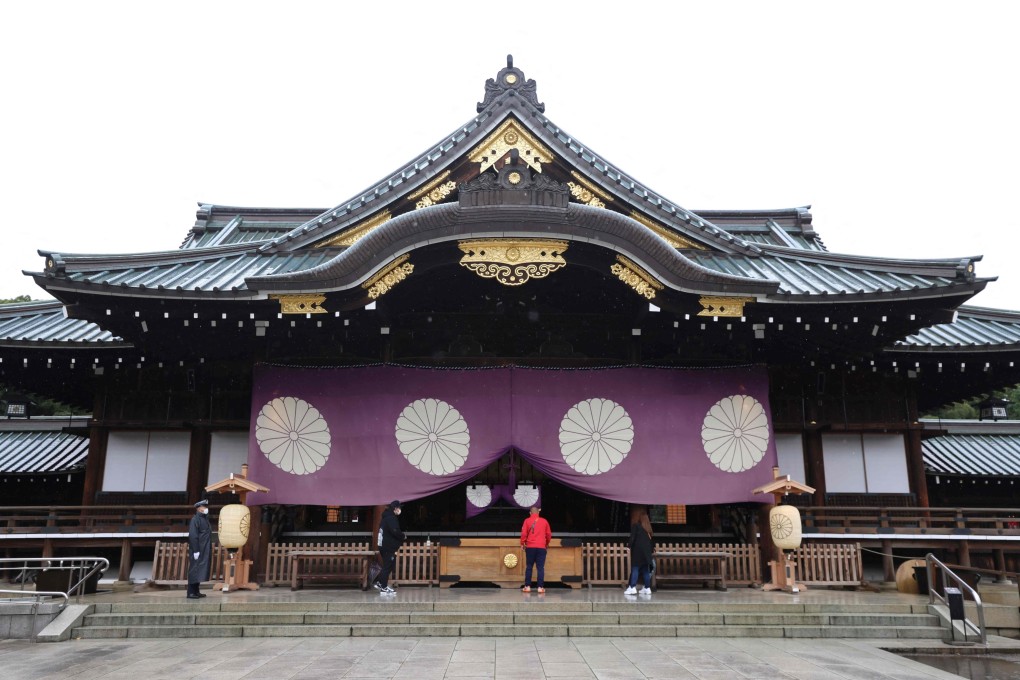 People pray at Yasukuni Shrine in Tokyo. File photo: AFP