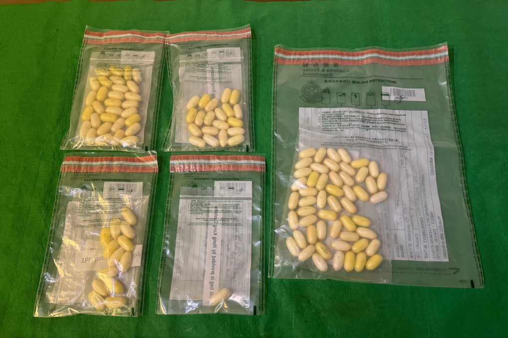 Pellets of cocaine seized as evidence. The drug trafficking case will be heard at West Kowloon Court on Monday. Photo: SCMP