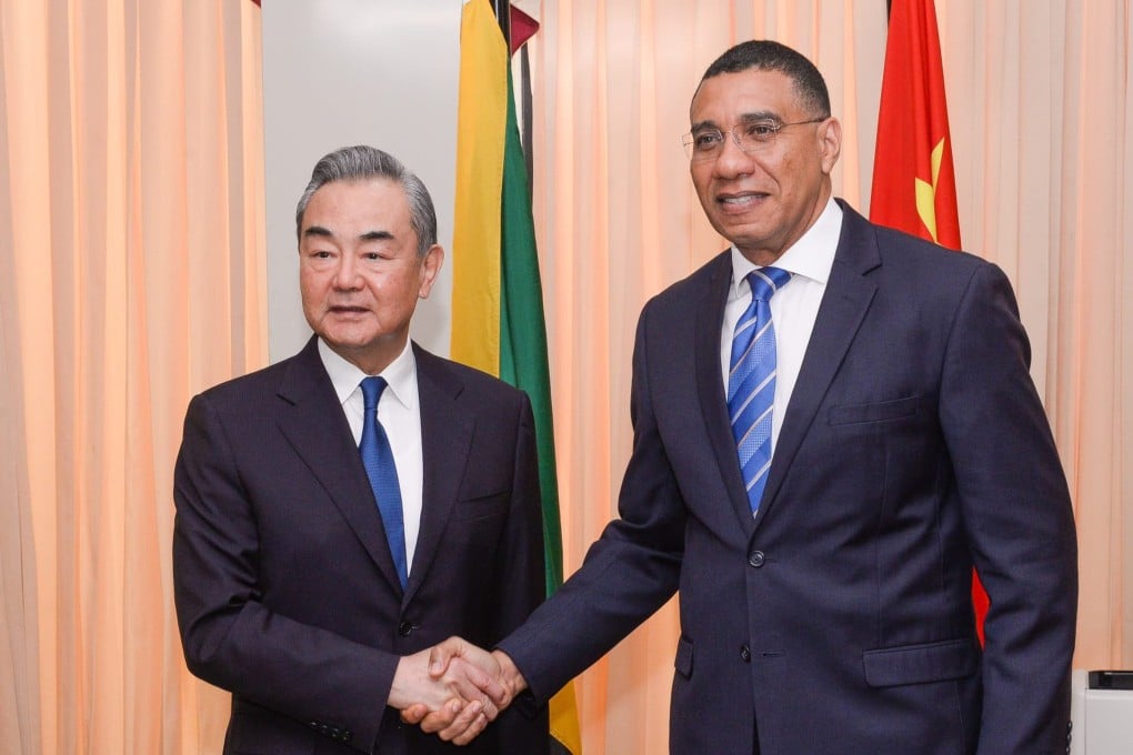 Wang Yi with Jamaican Prime Minister Andrew Holness in Kingston, the last stop on a six-nation tour for the Chinese foreign minister. Photo: X/AndrewHolnessJM