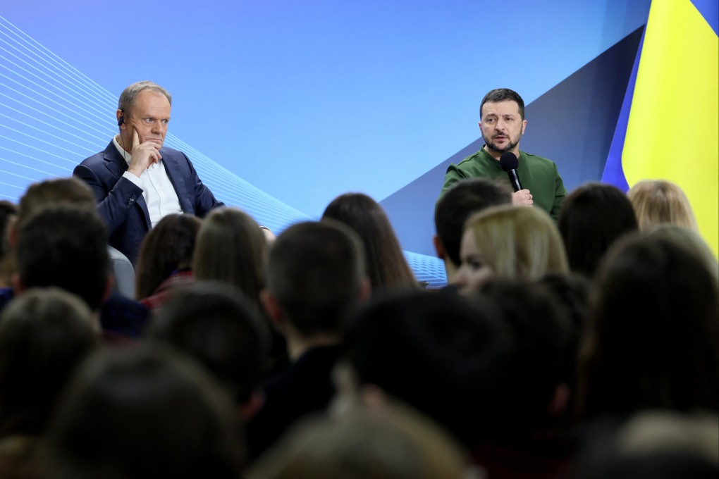 Polish Prime Minister Donald Tusk and Ukrainian President Volodymyr Zelenskiy visit the National University of Kyiv-Mohyla Academy, amid Russia’s attack on Ukraine, in Kyiv, Ukraine, January 22, 2024. REUTERS/Gleb Garanich