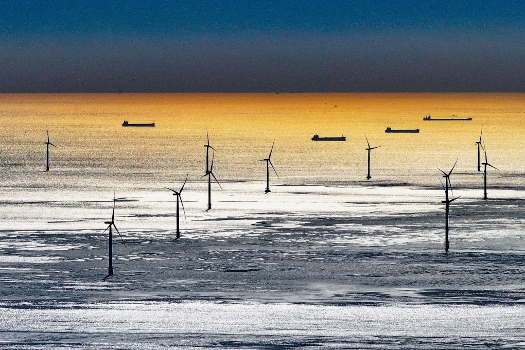 (231223) -- TANGSHAN, Dec. 23, 2023 (Xinhua) -- This aerial photo taken on Dec. 22, 2023 shows an offshore wind farm in Tangshan City, north China’s Hebei Province. In recent years, Tangshan City in Hebei Province encouraged the development of clean energy and promoted the construction of wind and solar power plants. By far, the installed capacity of clean energy in Tangshan reached 3.242 million kilowatts. (Xinhua/Yang Shiyao)