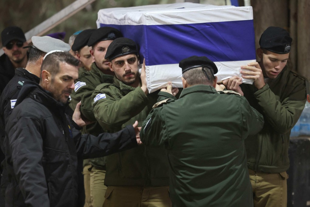 Israeli troops carry the coffin of a fellow soldier, a day after he was killed in combat in the Gaza Strip amid ongoing battles between Israel and the Palestinian militant group Hamas. Photo: AFP