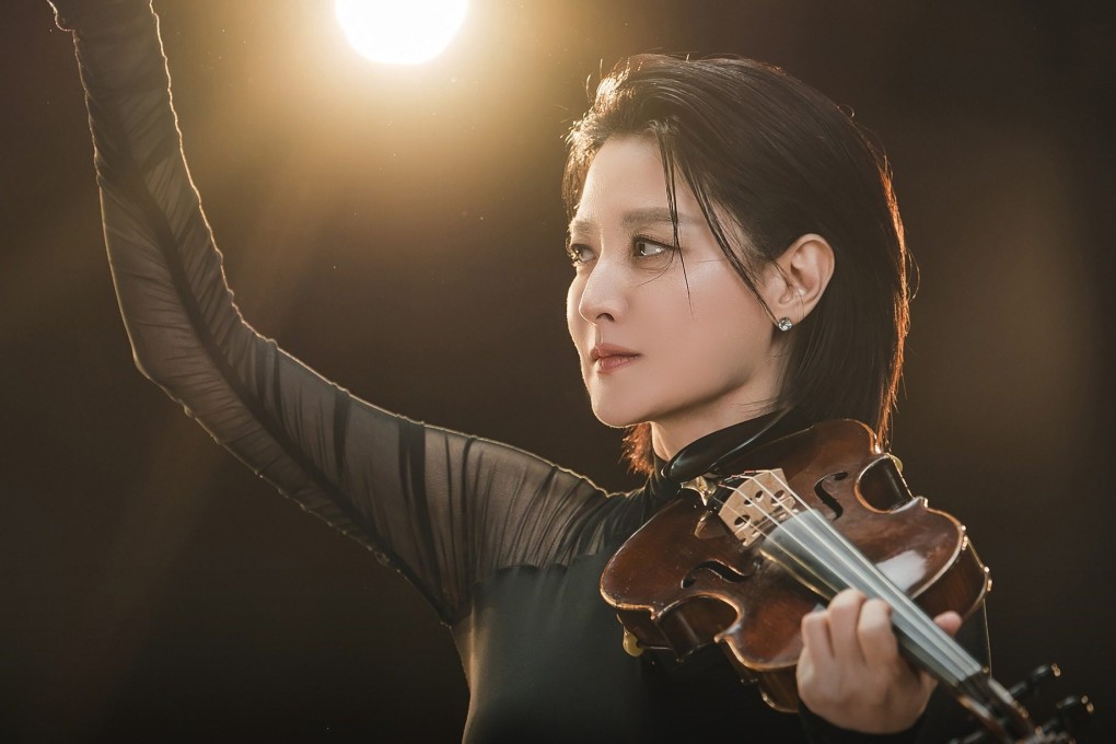 Lee Young-ae as orchestra conductor and violinist Cha Se-eum in a still from Disney+ Korean drama series “Maestra: Strings of Truth”.