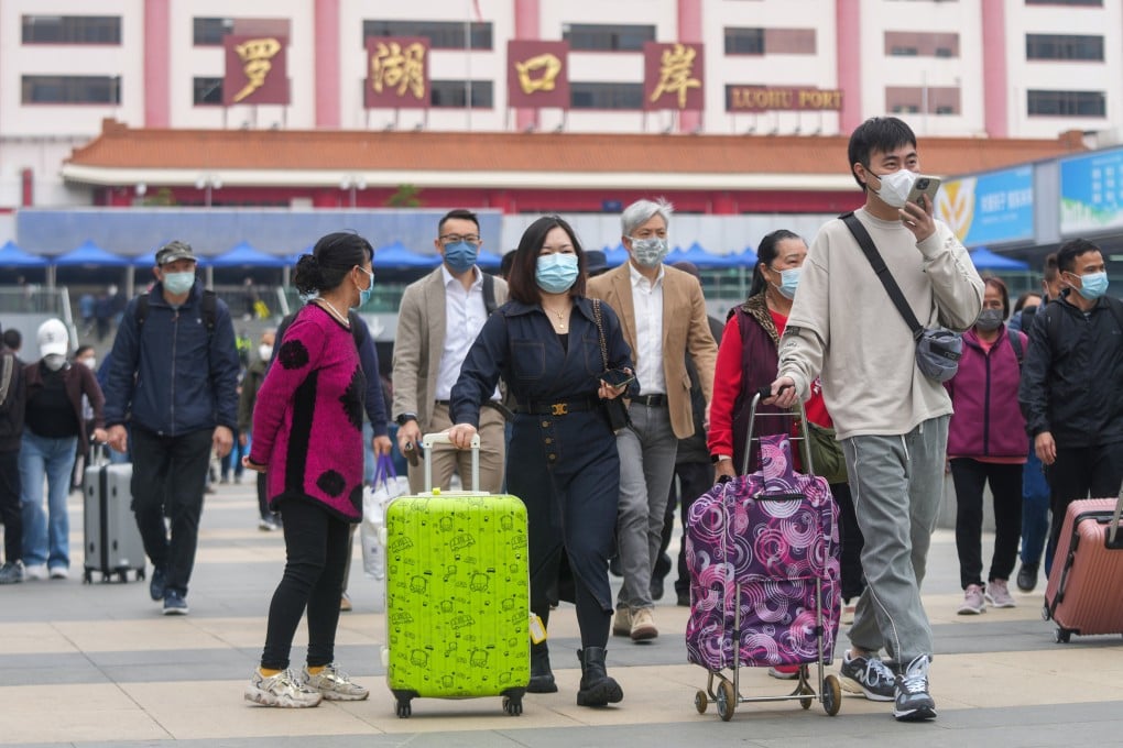 Travellers arrive at the Lo Wu border crossing in Shenzhen. Photo: Sam Tsang