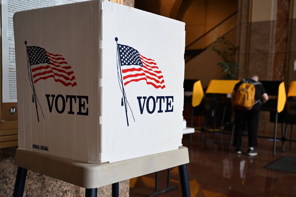 A voter prepares their ballot at a polling station in Los Angeles, California, on November 1, 2022. File photo: AFP