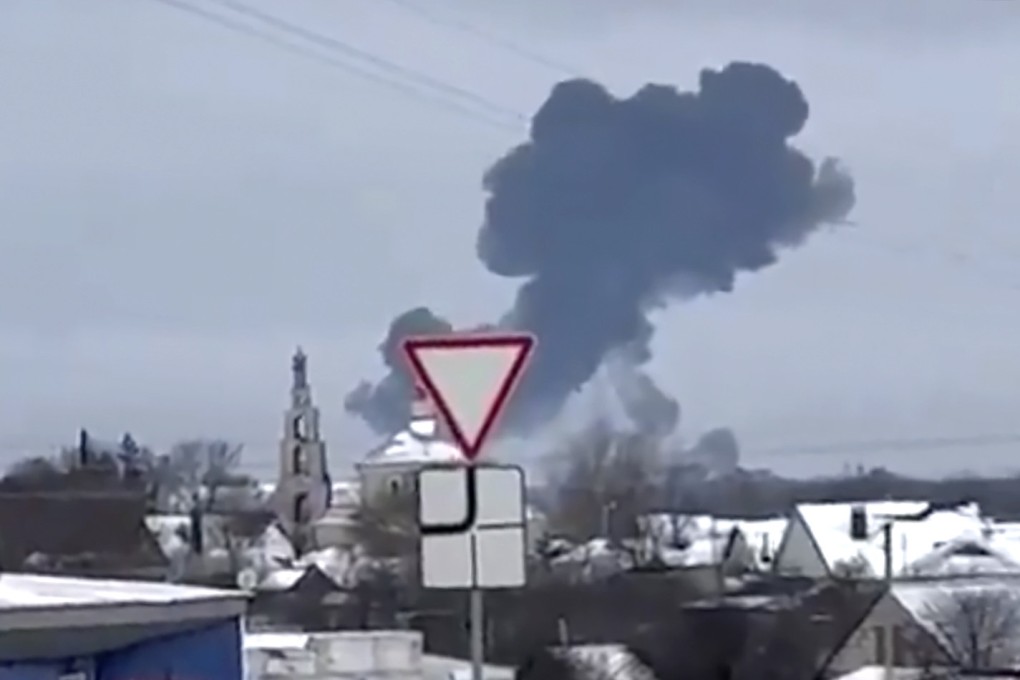 Smoke rises from the scene of a warplane crash at a residential area near Yablonovo, Belgorod region on Wednesday. Russia says a military transport plane that was carrying 65 Ukrainian prisoners of war crashed in a Russian region near Ukraine. Photo: Validated UGC video via AP