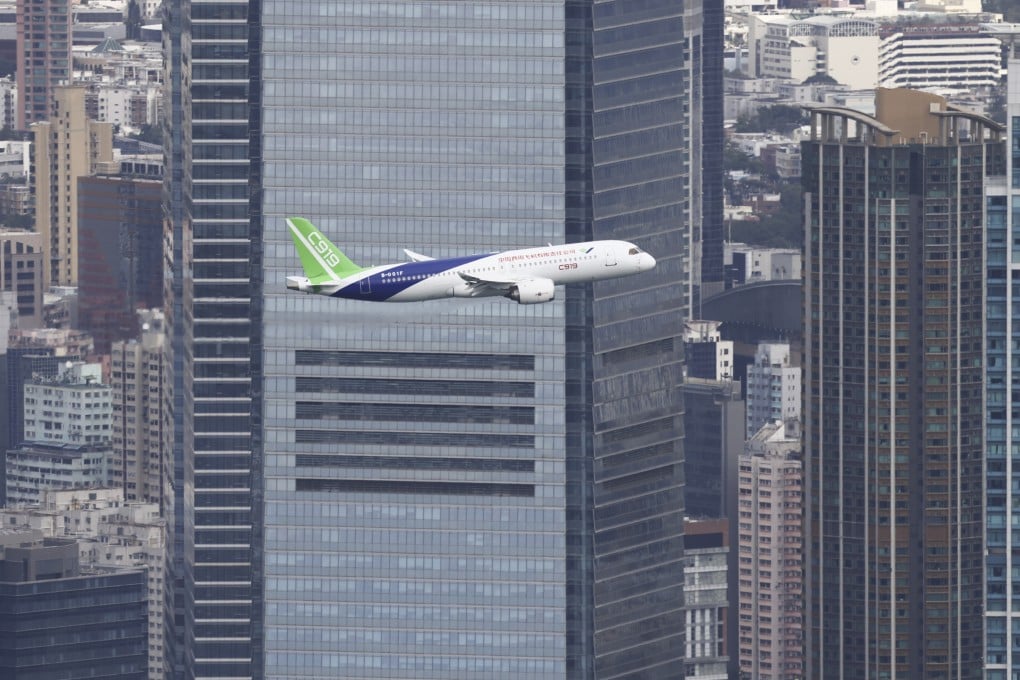 A C919 flies over Hong Kong’s Victoria Harbour in December. Photo: Dickson Lee