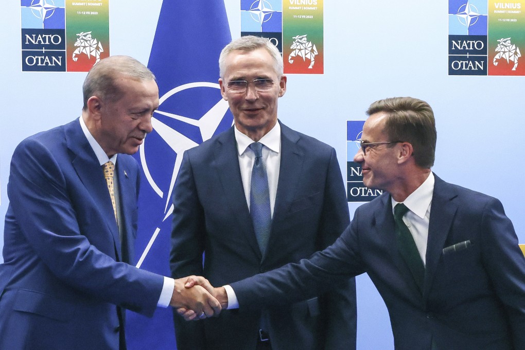 Turkey’s President Recep Tayyip Erdogan (left) shakes hands with Sweden’s Prime Minister Ulf Kristersson (right), as Nato Secretary General Jens Stoltenberg looks on. Photo: Pool Photo via AP