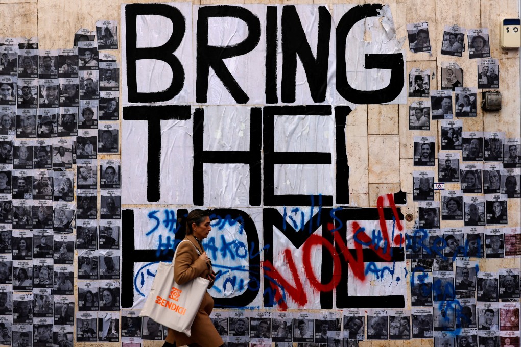 A wall with posters of the hostages, in Tel Aviv, Israel. Photo: Reuters