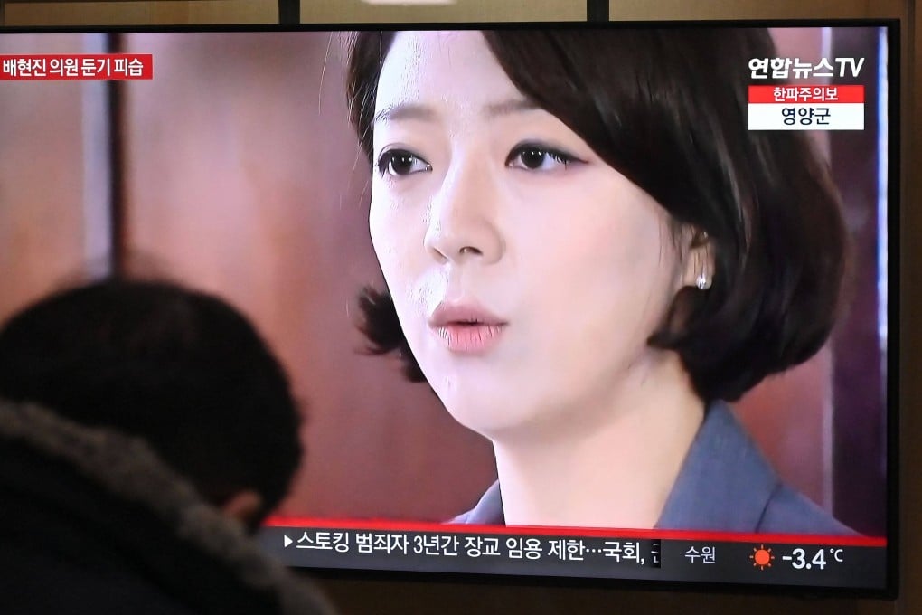 A television screen shows a news broadcast of ruling party lawmaker Bae Hyun-jin being attacked. Photo: AFP