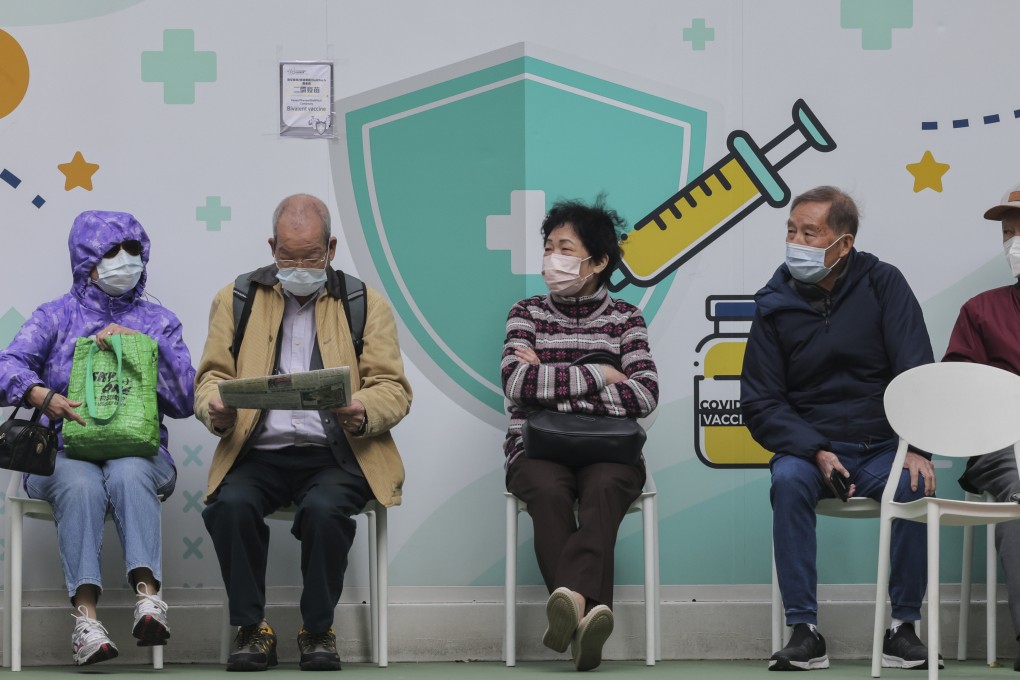 Residents waiting to get Covid-19 jabs at a clinic last year. Photo: Jelly Tse