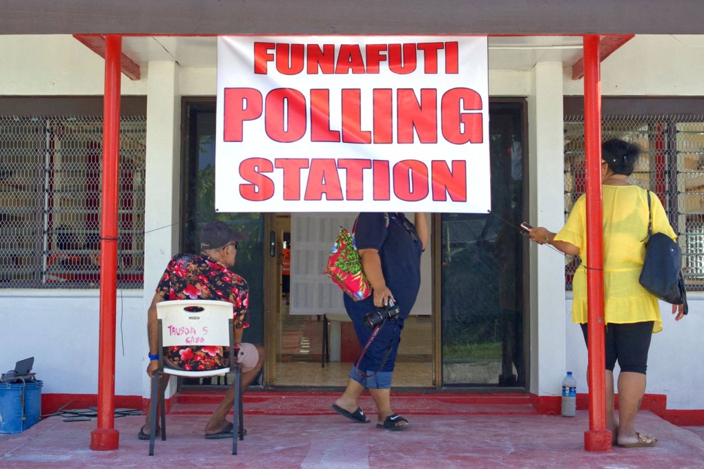 People wait outside a polling station in Funafuti, Tuvalu, on January 25. Photo: AFP