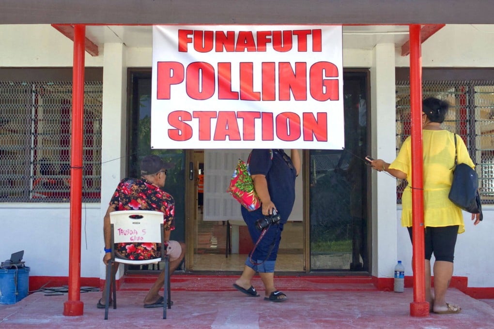 People wait outside a polling station in Funafuti, Tuvalu, on January 25. Photo: AFP