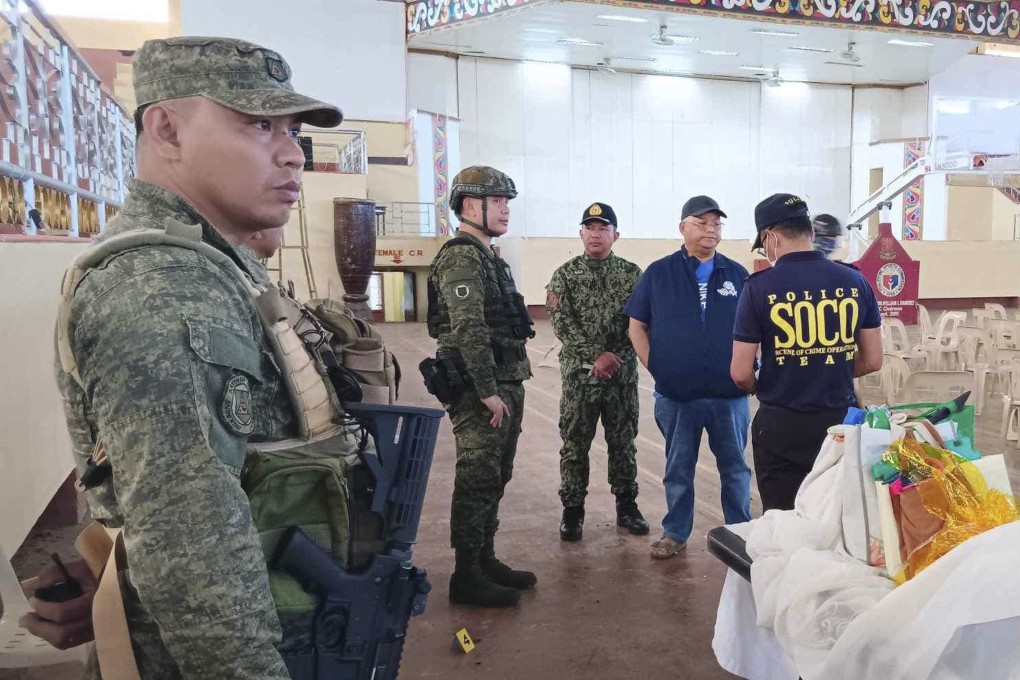 Law enforcers investigate at the site of a fatal explosion during a Catholic Mass in the southern Philippines in December. Photo: AP