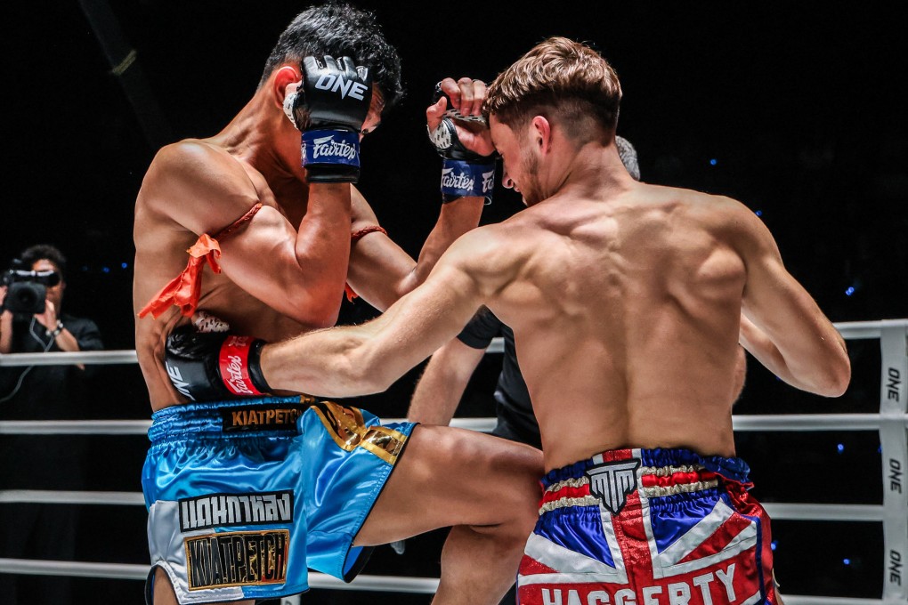 Freddie Haggerty (right) punches Dankalong Sor Dechaphan during their strawweight fight at ONE Friday Fights 49. Photo: ONE Championship
