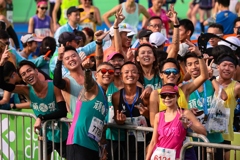 Runners arrive at Standard Chartered Hong Kong Marathon 2024 finish line at Victoria Park, Causeway Bay on January 21, 2024. Photo: May Tse