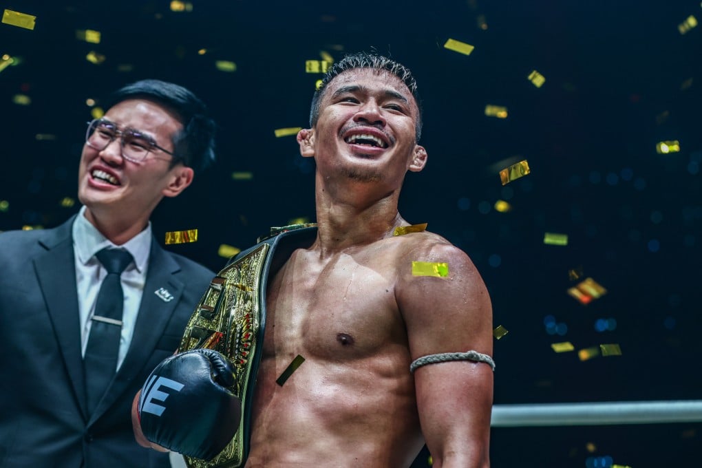 Superlek Kiatmoo9 celebrates after successfully defending his flyweight kickboxing title at ONE 165. Photo: ONE Championship