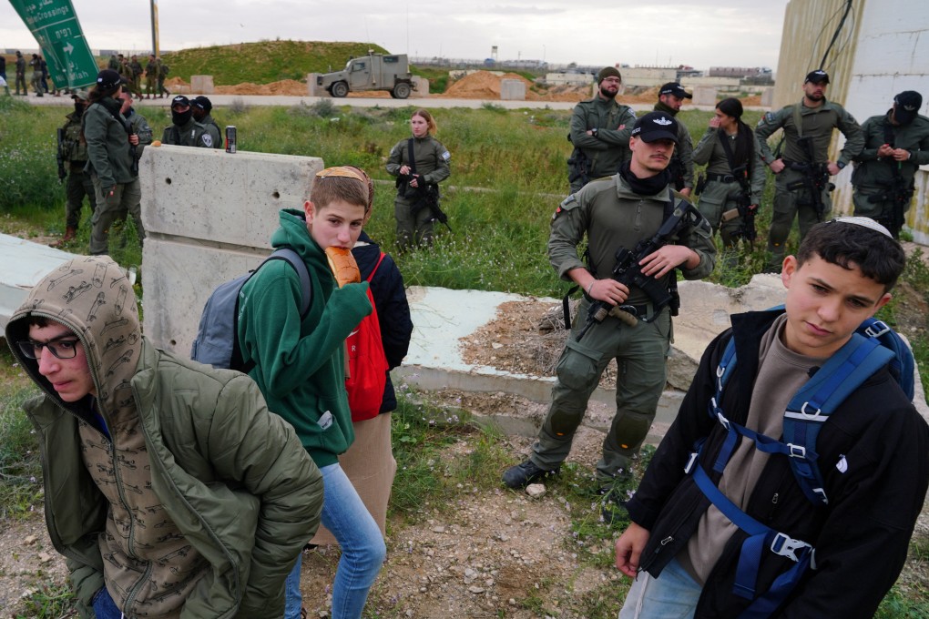 Families of hostages and supporters protest against the delivery of humanitarian aid to Gaza, demanding immediate release of hostages kidnapped on the deadly October 7 attack by Palestinian Islamist group Hamas, in Kerem Shalom, Israel, January 28, 2024. Photo: Reuters