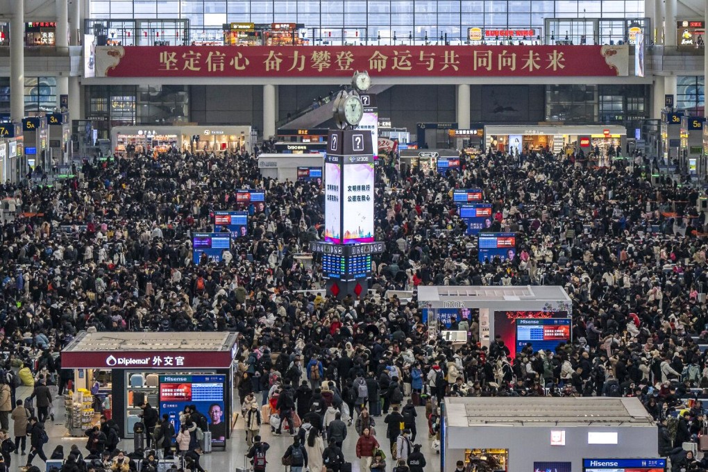 Travellers gather at Shanghai Hongqiao railway station on Friday, the first day of China’s Lunar New Year travel period. Photo: Bloomberg