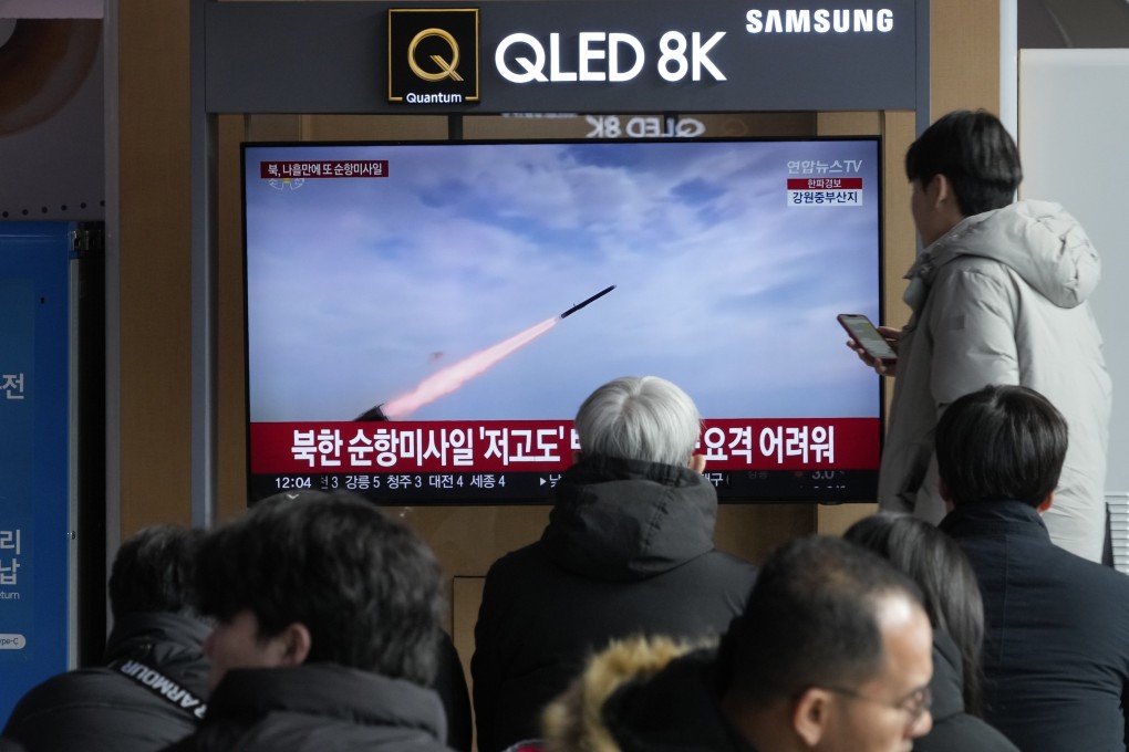 People watch a news broadcast pertaining to a North Korean missile launch, at the Seoul Railway Station in Seoul, South Korea, on Sunday. Photo: AP